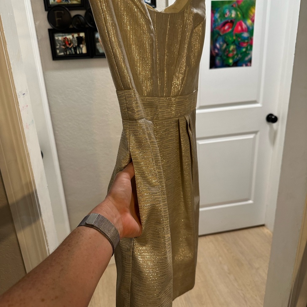 Metallic gold cocktail dress. Would be great for a charity event or holiday.